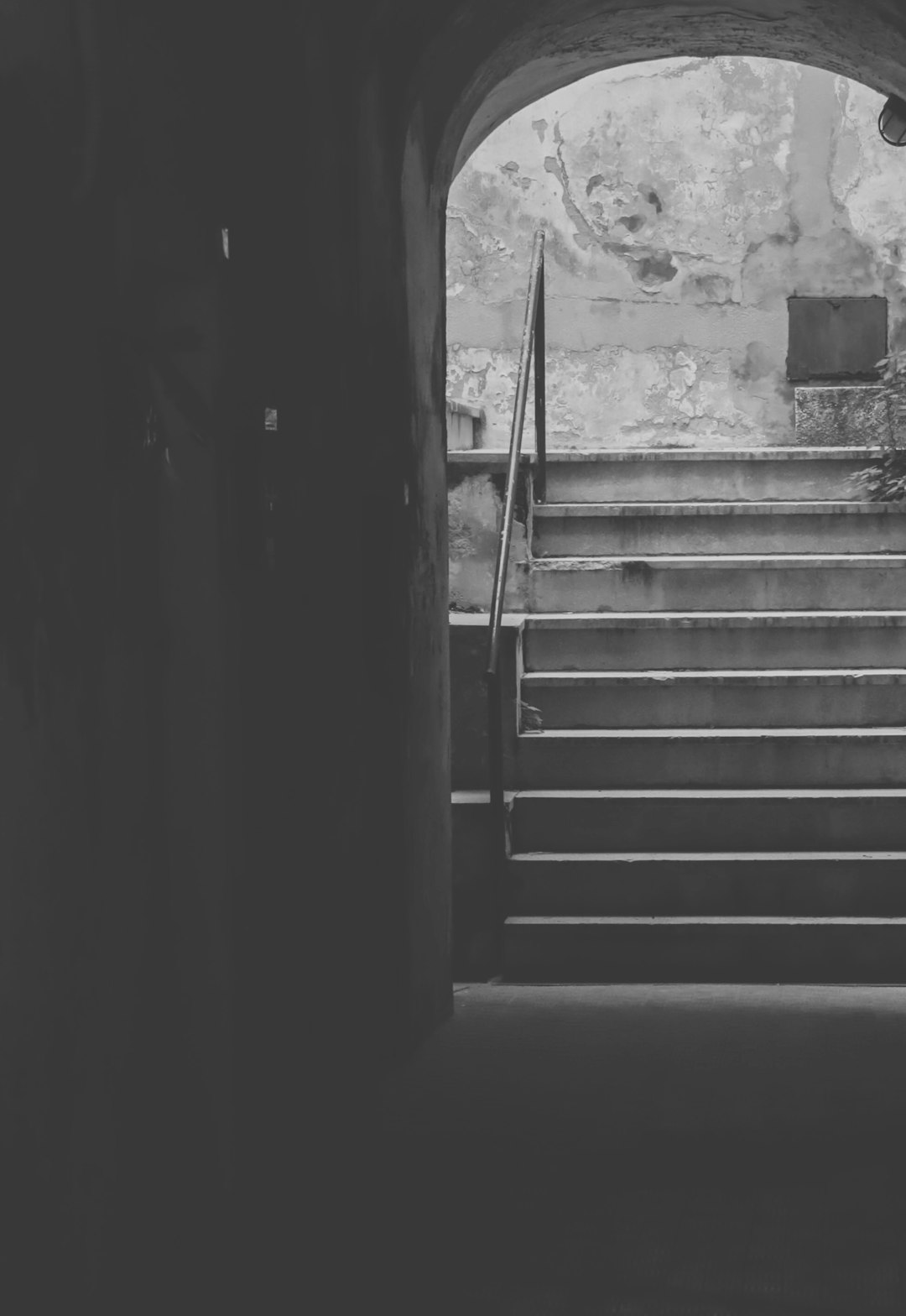 a black and white photo of a set of stairs