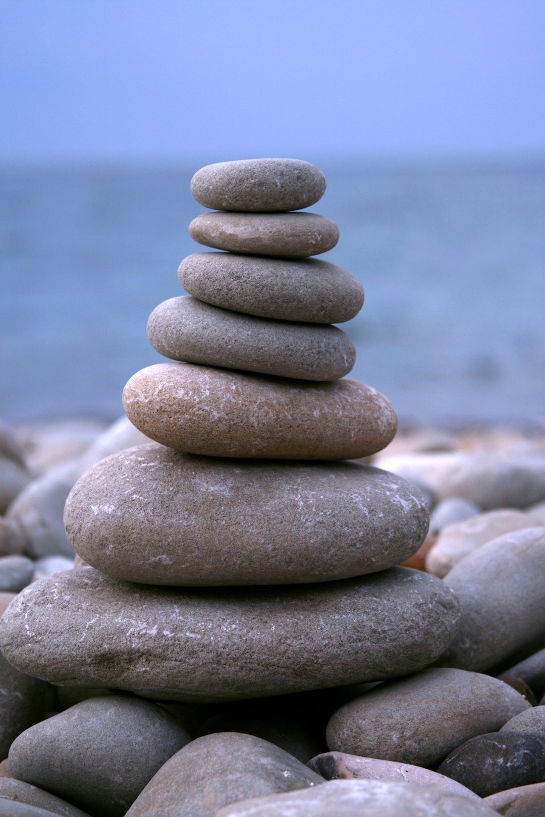 A stack of rocks sitting on top of a beach